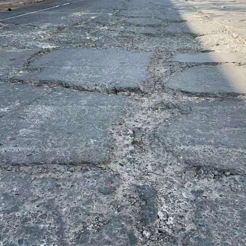 双台子路面起砂露石子修补料